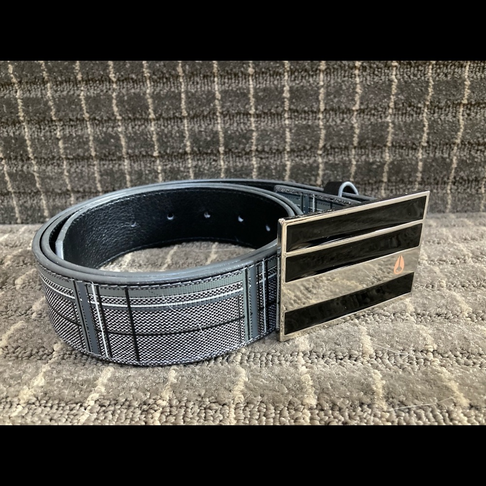 Black Nixon belt buckle with Hurley belt